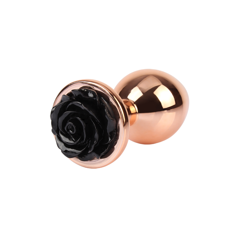 plug anal de metal dorado con gema rosa