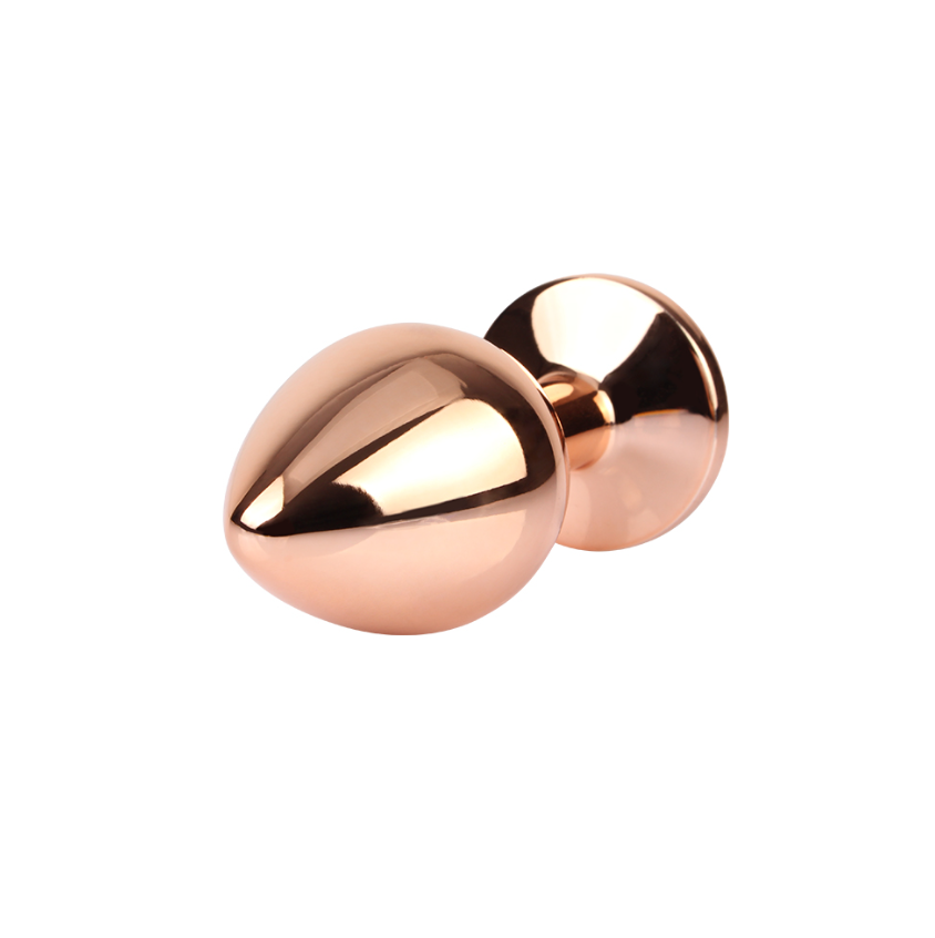 plug anal de metal dorado con gema rosa